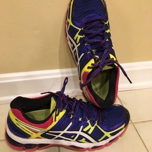 Women’s size 11 ASICS running shoes.